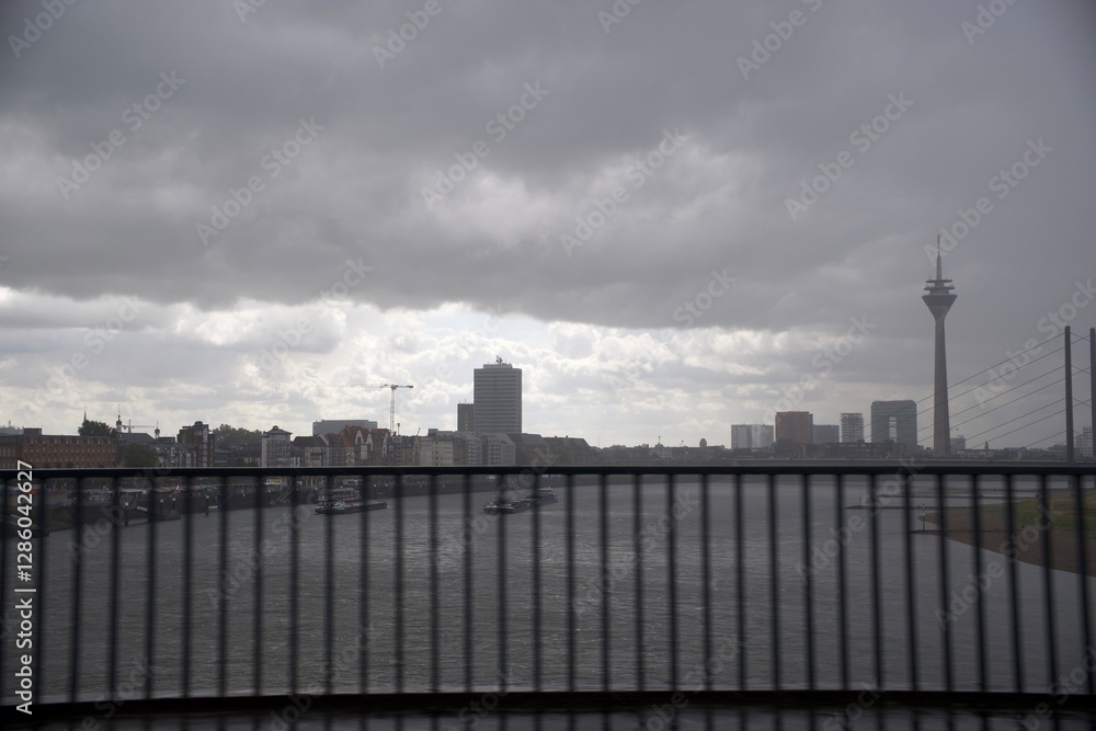 Naklejka premium View from the bridge over the river to the business districts of the European metropolis