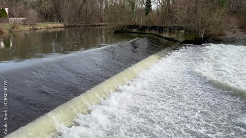 Water flows down a weir