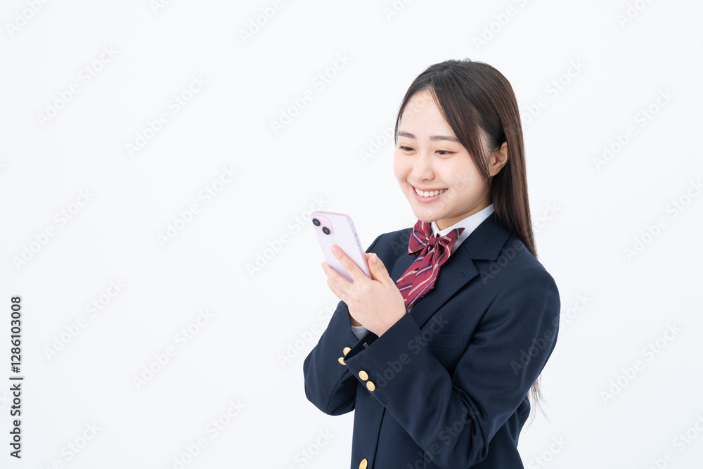 スマホを使う女子高生
