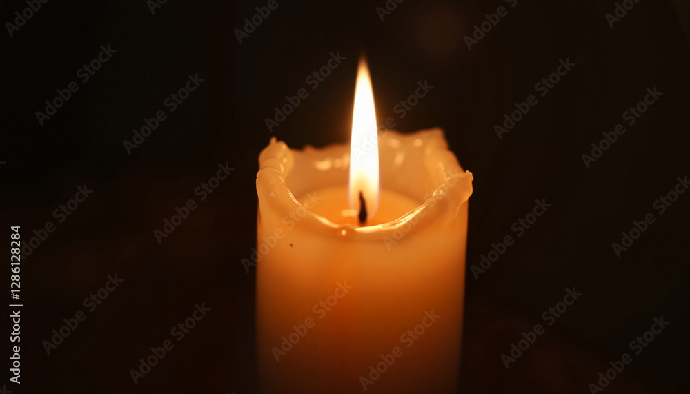 Burning candle in dark environment Burning candle in dark environment