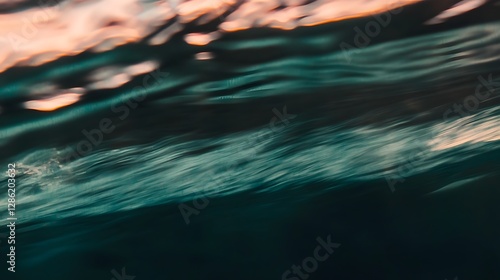 Captivating underwater abstract scene featuring a mesmerizing blend of cerise and emerald colors with cinematic motion blur light rays and a depth of field creating a dreamlike