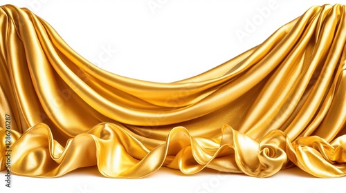 Exquisite golden silk fabric draped elegantly in soft textures and luminous colors photo