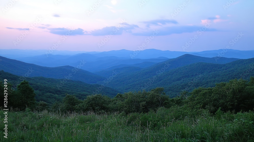 Fototapeta premium Scenic Mountain Range Landscape at Dusk with Rolling Hills and Sky