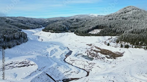 Wallpaper Mural Aerial view of the empty water reservoir at the Soboth Stausee, Styria Torontodigital.ca