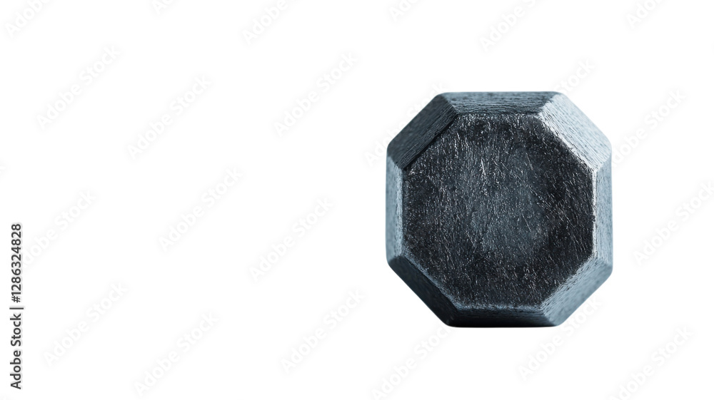 Unique octagonal metal object displayed on a clean surface with soft lighting in a minimalistic setting