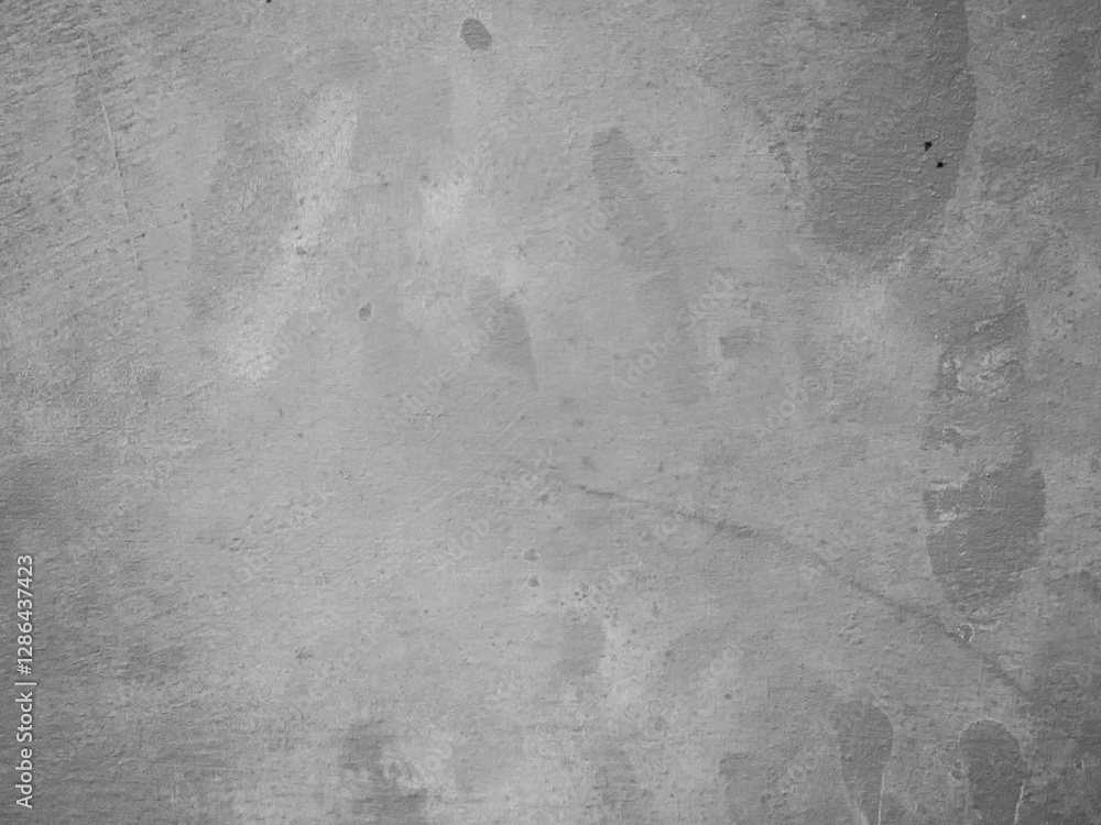 Naklejka premium Smooth, light gray wall with faint markings and a clean, minimalist appearance.