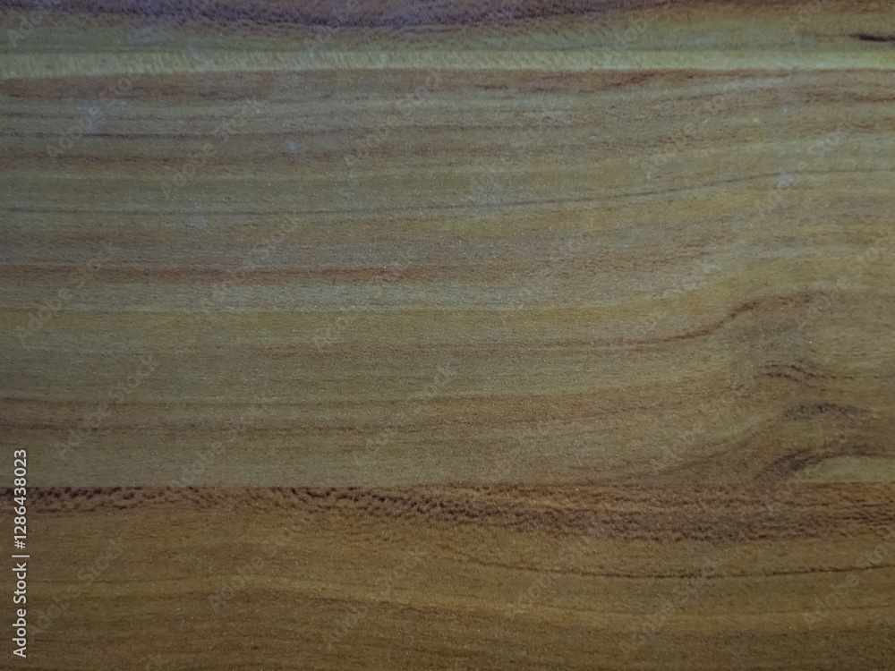 Fototapeta premium Close-up of a wooden surface with rich brown tones and natural grain variations.