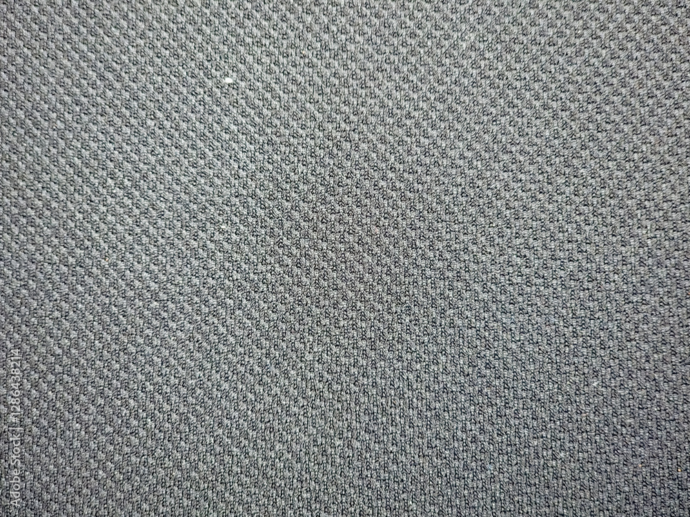 Textured fabric with a dark gray color, featuring a subtle woven pattern. Textured fabric with a dark gray color, featuring a subtle woven pattern.