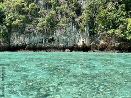 tropical island in Thailand with turquoise clear sea.