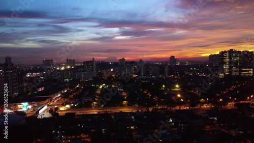 Wallpaper Mural Drone view of Damansara Utama suburb with illuminated buildings and busy streets at sunset Torontodigital.ca