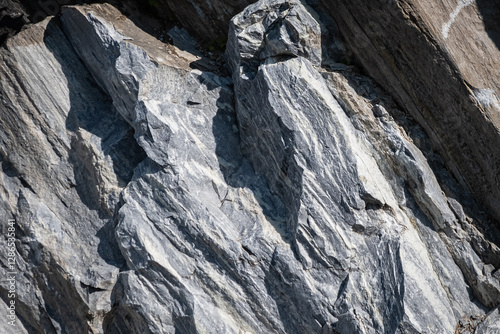 Photography Close up of a wall of cracked rock