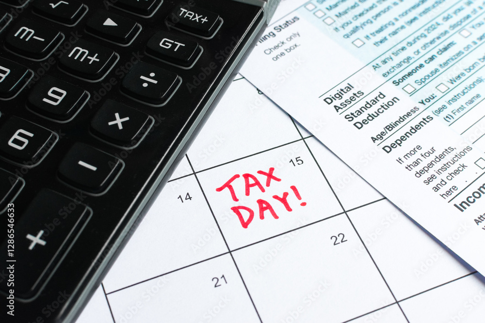 Close up shot of a calendar, with Tax Day reminder on the 15th, deadline for submission. With a calculator and Form 1040 U.S. Individual Income Tax Return. Taxation, tax season, reminder, extension