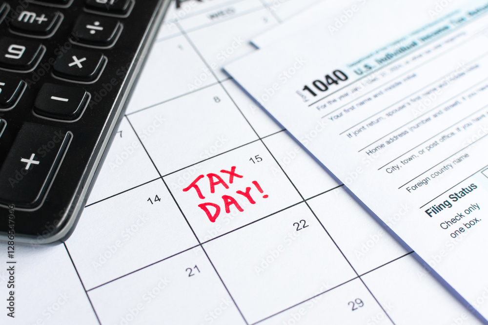 Close up shot of a calendar, with Tax Day reminder on the 15th, deadline for submission. With a calculator and Form 1040 U.S. Individual Income Tax Return. Taxation, tax season, reminder, extension Close up shot of a calendar, with Tax Day reminder on the 15th, deadline for submission. With a calculator and Form 1040 U.S. Individual Income Tax Return. Taxation, tax season, reminder, extension