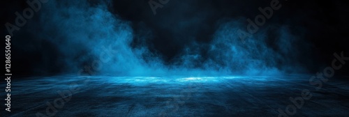 Mysterious blue fog envelops a dark stage creating an atmospheric and dramatic setting for a performance or event