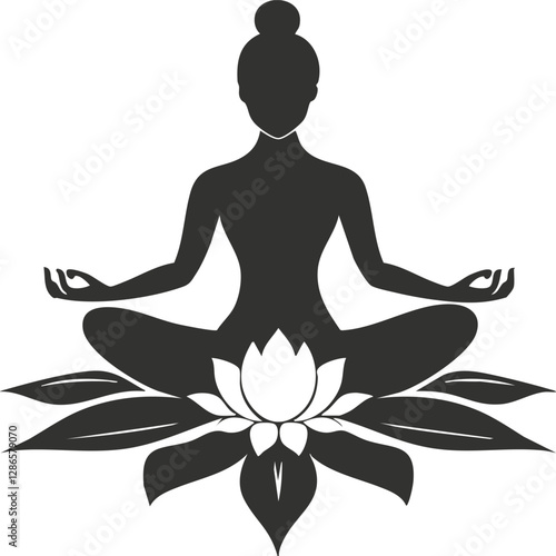 Silhouette of a woman meditating in lotus pose on a lotus flower.