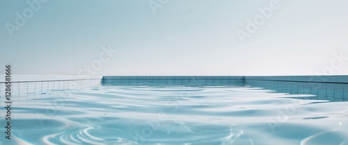 Clear blue swimming pool water with ripples and reflections creating a tranquil aquatic scene Copy Space. photo