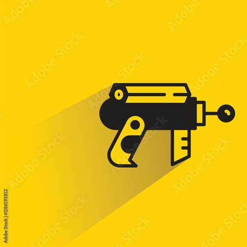 futuristic blaster gun on yellow background