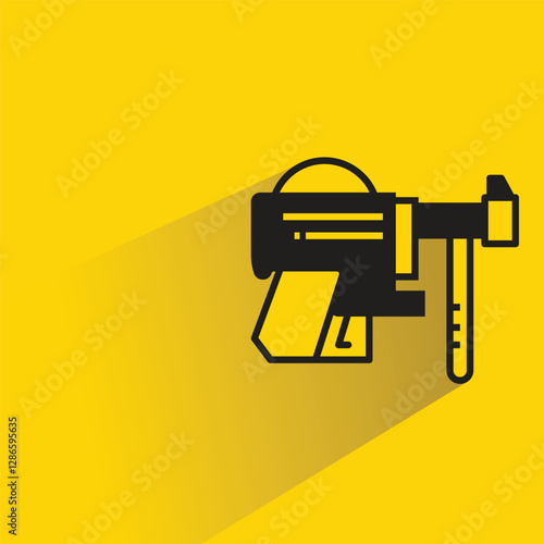 futuristic blaster gun on yellow background