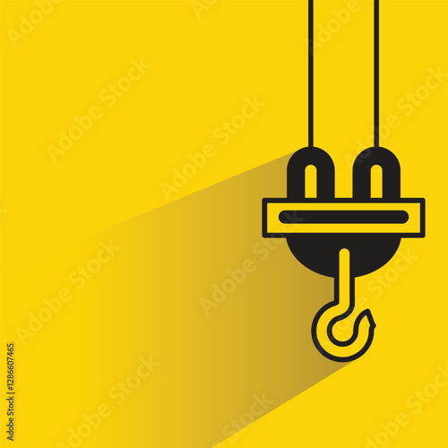 crane hook icon with drop shadow on yellow background
