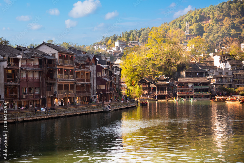 Obraz premium Fenghuang ancient town, China. Traditional chinese wooden houses in old watertown
