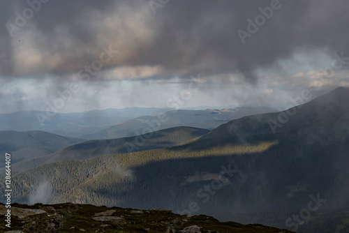 clouds forming directly overhead, observation from the top of the mountain