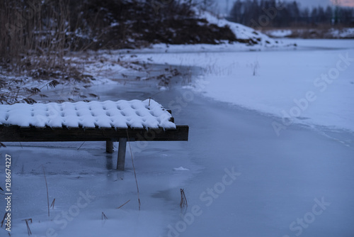 Wallpaper Mural footbridge frozen in ice. Snow covered water surface Torontodigital.ca