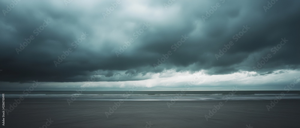 The stormy sky collides with a glass ocean below; the somber serenity creates a compelling harmony of opposites. The stormy sky collides with a glass ocean below; the somber serenity creates a compelling harmony of opposites.