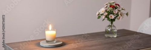 Wallpaper Mural Warmly lit candle on a minimalist stone table with a small vase of fresh flowers, soft lighting, calming atmosphere Torontodigital.ca