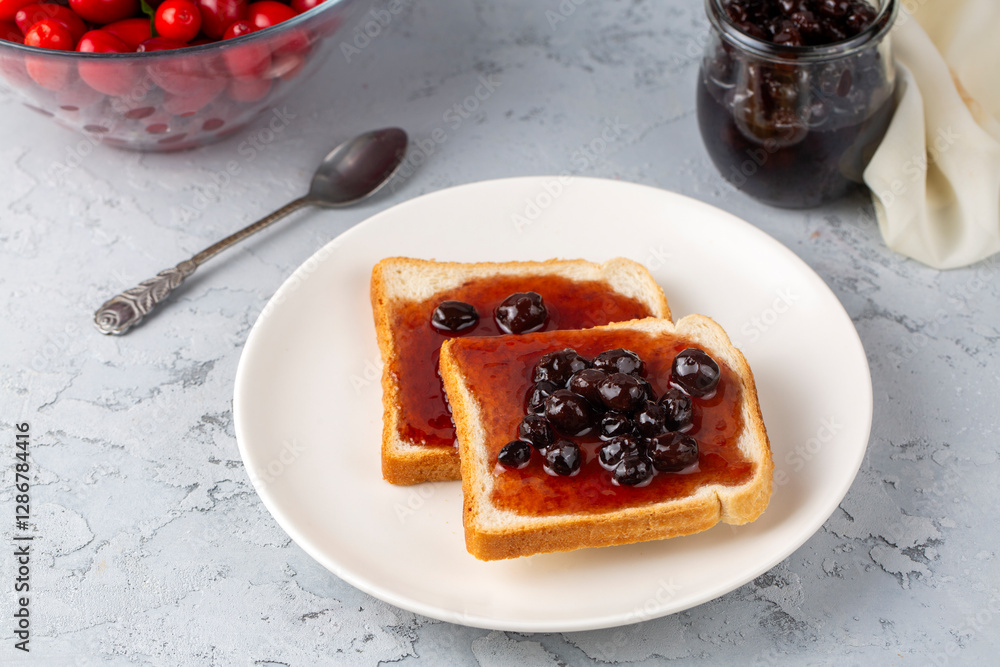Homemade dogwood cornel jam in glass jar