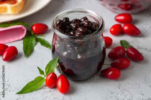 Homemade dogwood cornel jam in glass jar