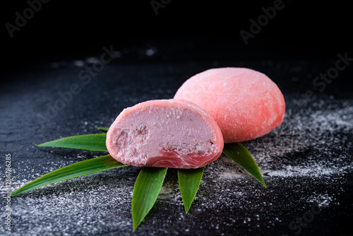strawberry dessert daifuku mochi on a dark background