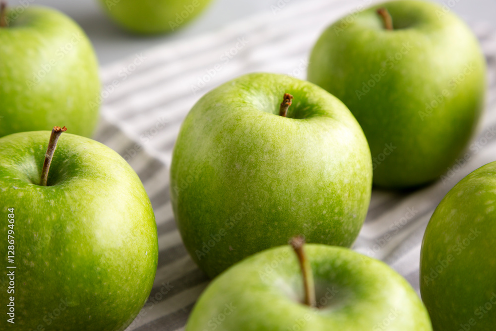 Organic Green Granny Smith Apples, side view. Close-up. Organic Green Granny Smith Apples, side view. Close-up.