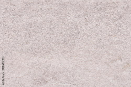 Neutral grey stone seamless repeating texture or background