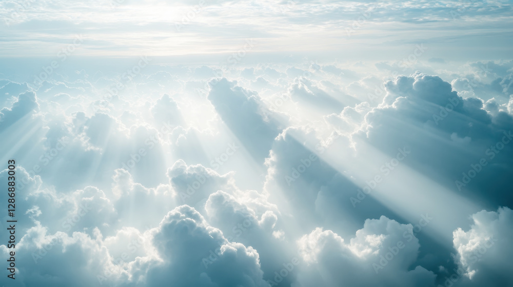 Fototapeta premium Majestic cloudy sky with sunlight rays creating a serene atmosphere