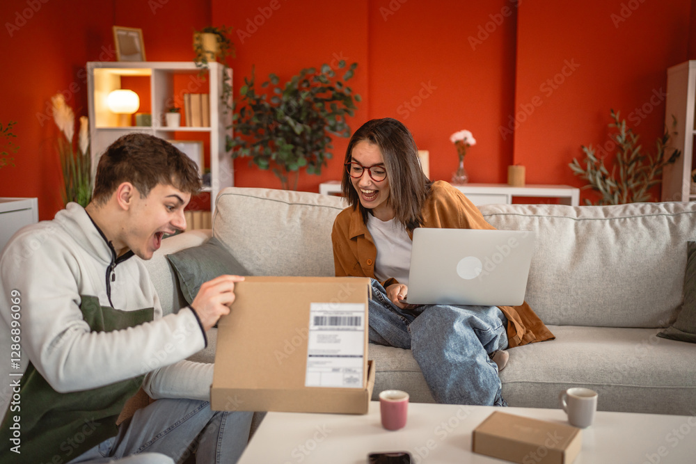 Two friends boyfriend and girlfriend enthusiastically open the package Two friends boyfriend and girlfriend enthusiastically open the package