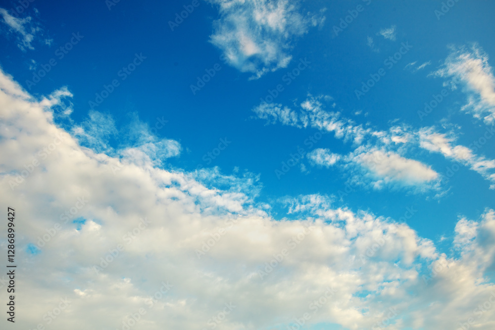 Obraz premium Cloudy sky background. Dramatic sky in daylight. Diagonal clouds