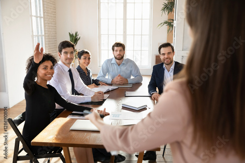 Quadro em tela Multi-ethnic professionals take part in business meeting or training, African fe