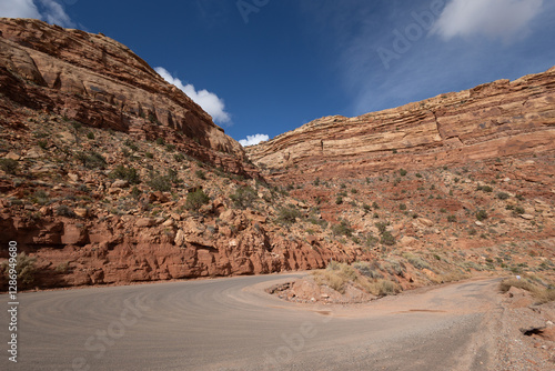 The Moki Dugway on Utah Highway 261 is a steep section of switchbacks going down a Cedar Mesa with beautiful views of valley below. photo