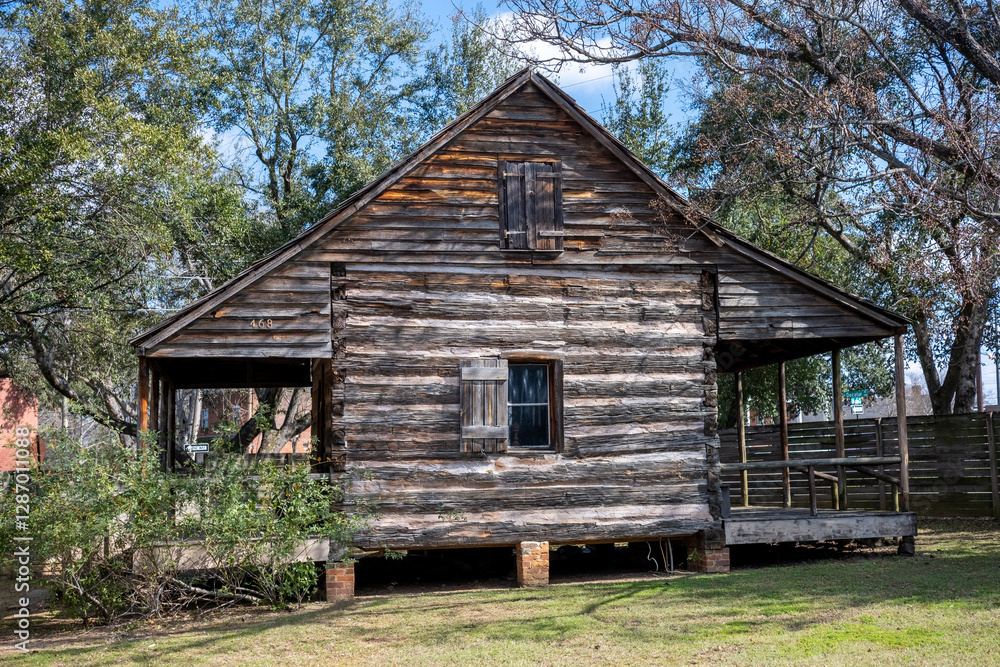 side view of old log cabin side view of old log cabin