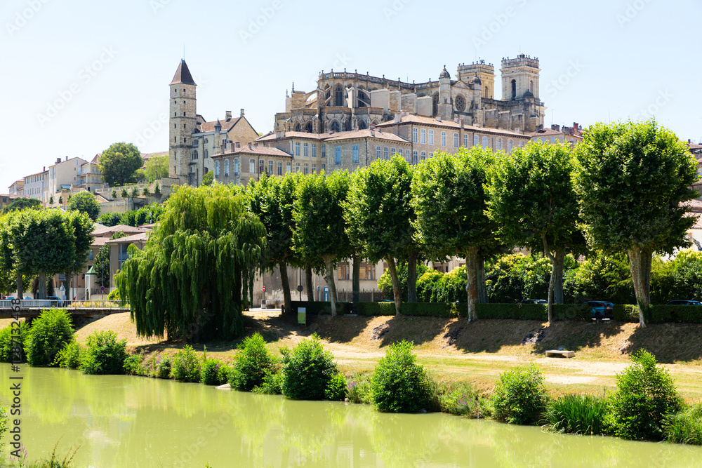 Picturesque summer landscape of French city of Auch overlooking Roman Catholic Cathedral and Armagnac Tower. View across Gers river Picturesque summer landscape of French city of Auch overlooking Roman Catholic Cathedral and Armagnac Tower. View across Gers river
