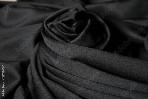 Foto Abstract background texture of black color fabric