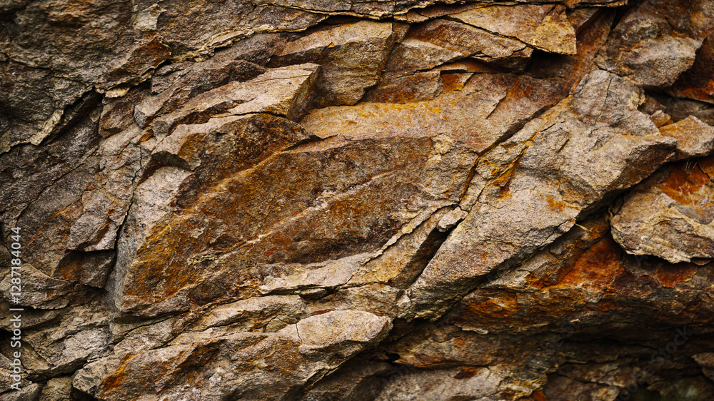 Brown orange rusty beige stone rock granite background. Mountain surface texture. Close-up. For design.