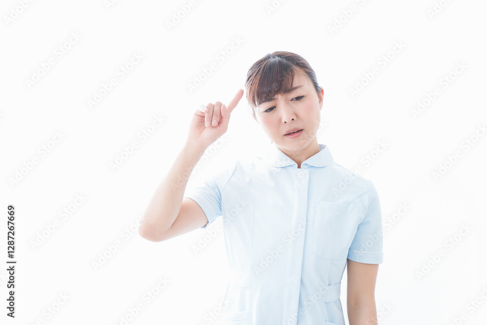 NOを示す若い看護師 NOを示す若い看護師