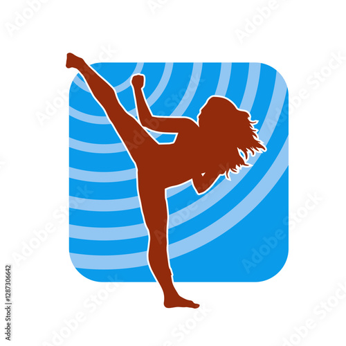 Silhouette of a woman kicking pose. Silhouette of a female martial art in action pose.