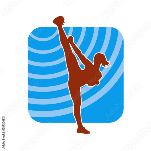 Silhouette of a woman kicking pose. Silhouette of a female martial art in action pose.