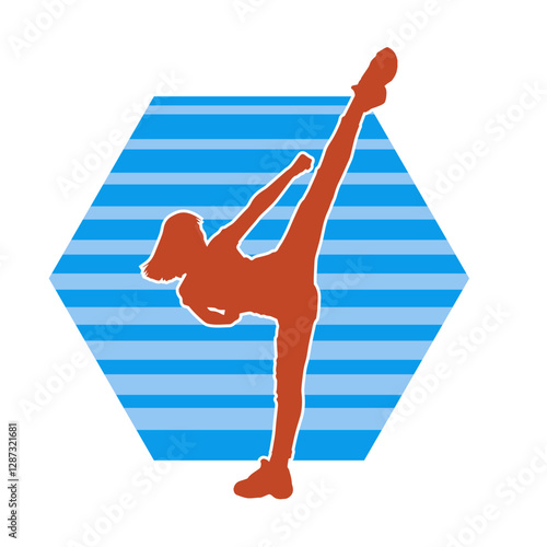 Silhouette of a slim female doing martial art pose. Silhouette of a martial art woman in action pose.