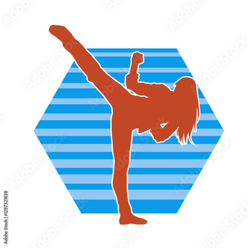 Silhouette of a slim female doing martial art pose. Silhouette of a martial art woman in action pose.