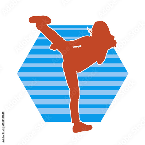 Silhouette of a slim female doing martial art pose. Silhouette of a martial art woman in action pose.