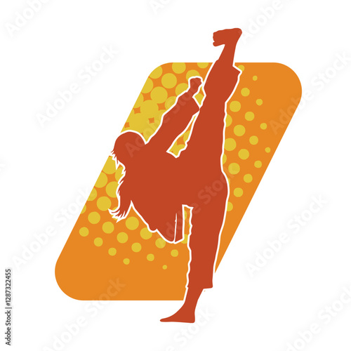 Silhouette of a slim female doing martial art pose. Silhouette of a martial art woman in action pose.