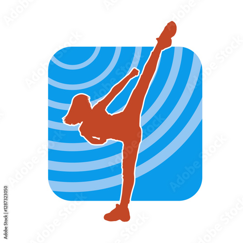 Silhouette of a slim female doing martial art pose. Silhouette of a martial art woman in action pose.